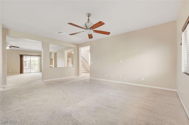 6402 Parrot Ridge Ct, Las Vegas, NV 89139 - carpeted empty room featuring a ceiling fan, stairs, and baseboards