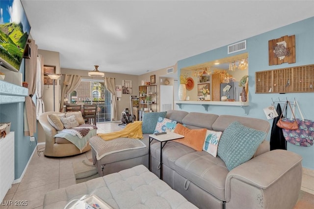 7950 W Flamingo Rd Unit 1003, Las Vegas, NV 89147 - living room with tile patterned floors and baseboards