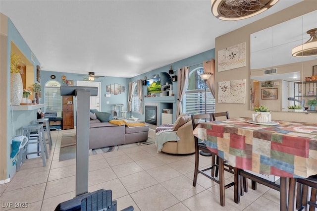 7950 W Flamingo Rd Unit 1003, Las Vegas, NV 89147 - dining space featuring ceiling fan and light tile patterned floors