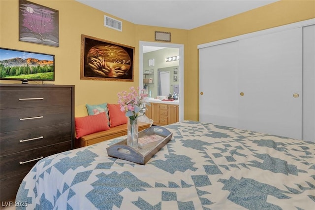 7950 W Flamingo Rd Unit 1003, Las Vegas, NV 89147 - bedroom featuring a closet and ensuite bathroom