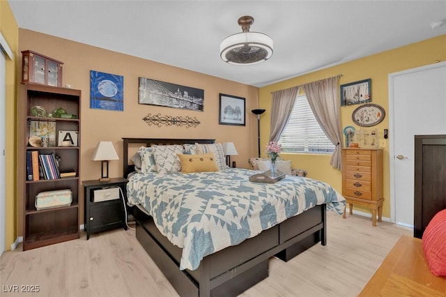 7950 W Flamingo Rd Unit 1003, Las Vegas, NV 89147 - bedroom with wood finished floors and baseboards