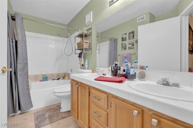 7950 W Flamingo Rd Unit 1003, Las Vegas, NV 89147 - full bathroom with shower / bath combo, double vanity, toilet, and tile patterned flooring