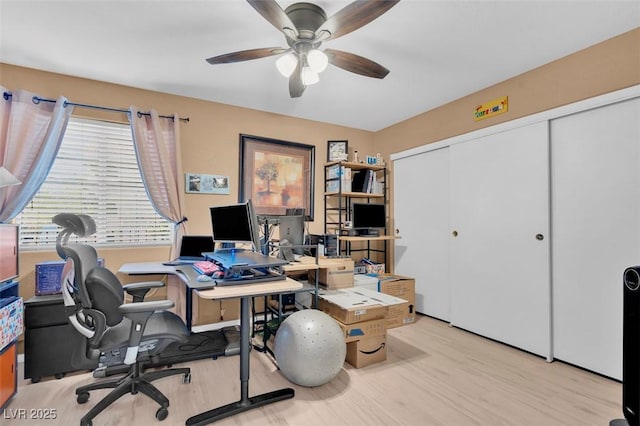 7950 W Flamingo Rd Unit 1003, Las Vegas, NV 89147 - home office with wood finished floors and a ceiling fan