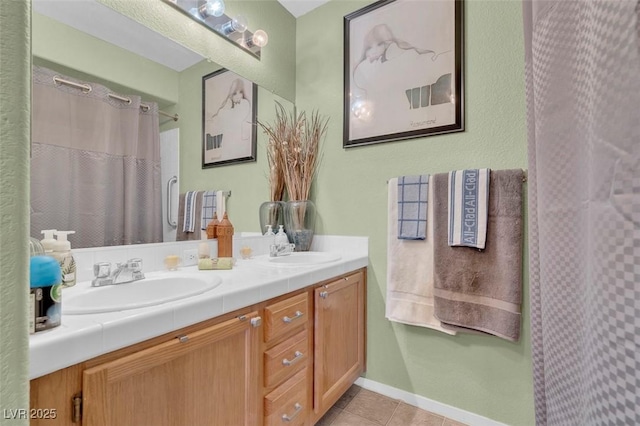 7950 W Flamingo Rd Unit 1003, Las Vegas, NV 89147 - full bath featuring double vanity and tile patterned flooring