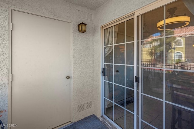 7950 W Flamingo Rd Unit 1003, Las Vegas, NV 89147 - property entrance with stucco siding