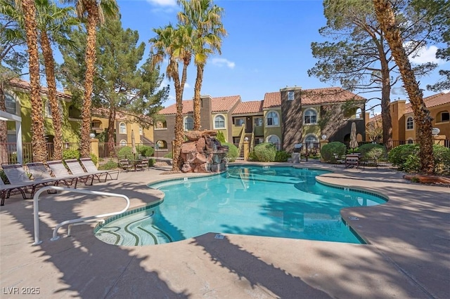 7950 W Flamingo Rd Unit 1003, Las Vegas, NV 89147 - community pool featuring a residential view and a patio
