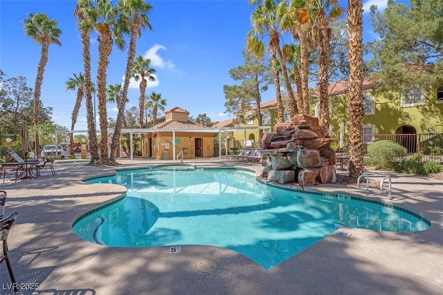 7950 W Flamingo Rd Unit 1003, Las Vegas, NV 89147 - community pool with a patio area