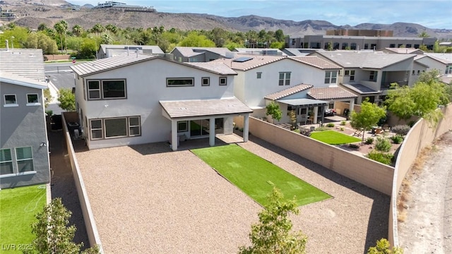 298 Grant Ridge Dr, Henderson, NV 89012 - back of property with a residential view, a fenced backyard, and a mountain view