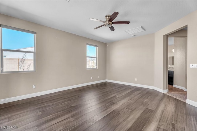 9091 Becket Ranch Ct, Las Vegas, NV 89113 - unfurnished room with a ceiling fan, wood finished floors, a fireplace, and baseboards