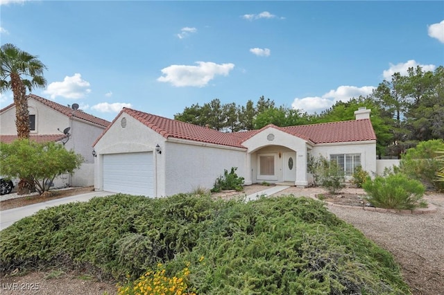 3201 Beacon Shores Cir, Las Vegas, NV 89117 - mediterranean / spanish-style house with a garage, a chimney, a tile roof, stucco siding, and driveway