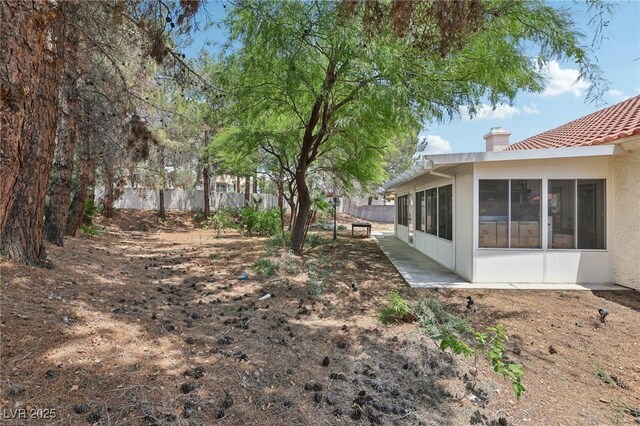 3201 Beacon Shores Cir, Las Vegas, NV 89117 - view of yard with a sunroom