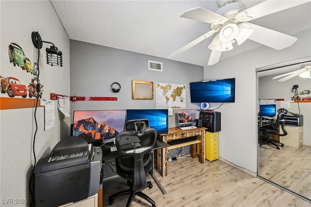 3201 Beacon Shores Cir, Las Vegas, NV 89117 - home office with ceiling fan, wood finished floors, and a textured ceiling