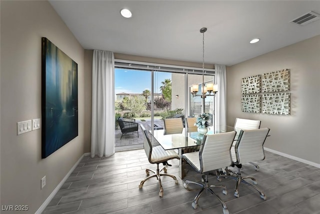4702 Amazing View St, Las Vegas, NV 89129 - dining space with a chandelier, baseboards, wood finished floors, and recessed lighting