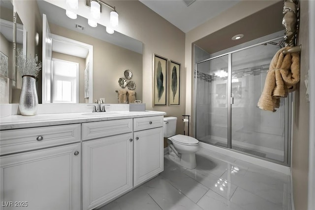 4702 Amazing View St, Las Vegas, NV 89129 - bathroom featuring toilet, marble look tile flooring, vanity, and a stall shower