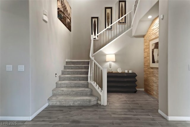 4702 Amazing View St, Las Vegas, NV 89129 - staircase featuring baseboards and wood finished floors