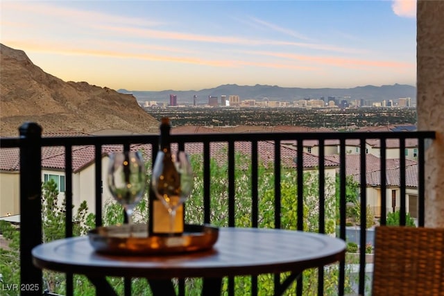 4702 Amazing View St, Las Vegas, NV 89129 - balcony at dusk featuring a mountain view