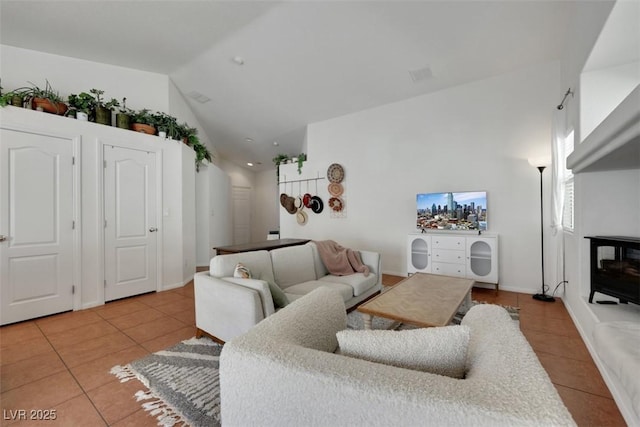 520 Blackbird Knoll Ct, North Las Vegas, NV 89084 - tiled living area with high vaulted ceiling