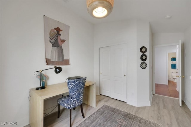 520 Blackbird Knoll Ct, North Las Vegas, NV 89084 - office area with light wood-type flooring and baseboards