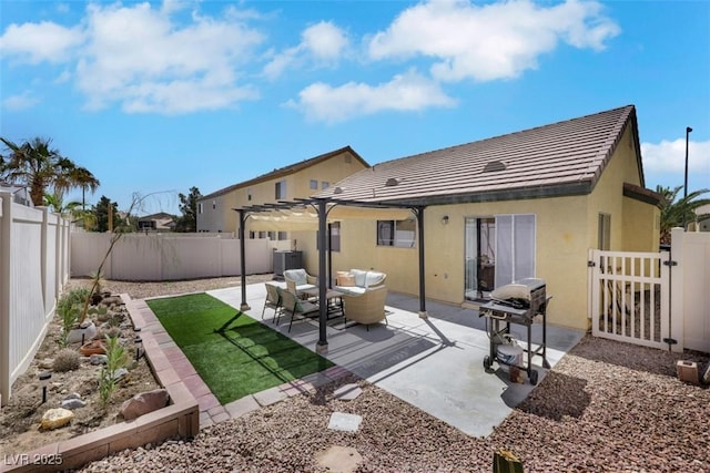 520 Blackbird Knoll Ct, North Las Vegas, NV 89084 - rear view of property featuring a fenced backyard, a tiled roof, stucco siding, a patio, and a gate