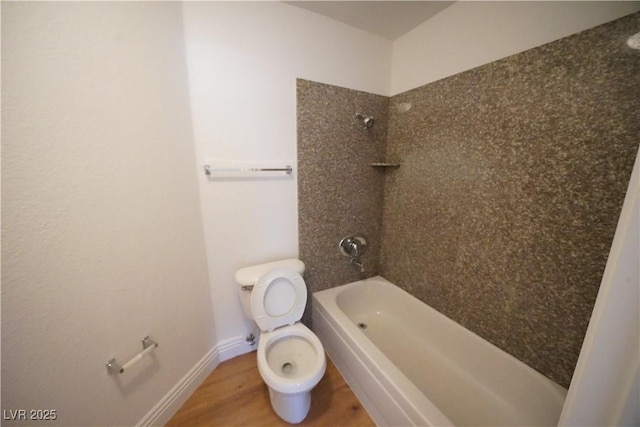 2606 S Durango Dr Unit 165, Las Vegas, NV 89117 - full bathroom featuring toilet, wood finished floors, washtub / shower combination, and baseboards
