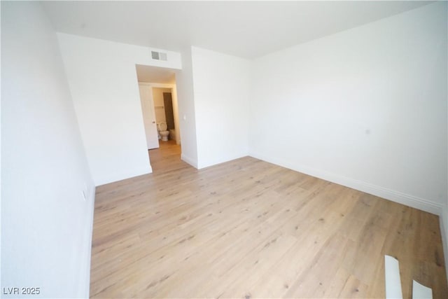 2606 S Durango Dr Unit 165, Las Vegas, NV 89117 - spare room with light wood-style floors