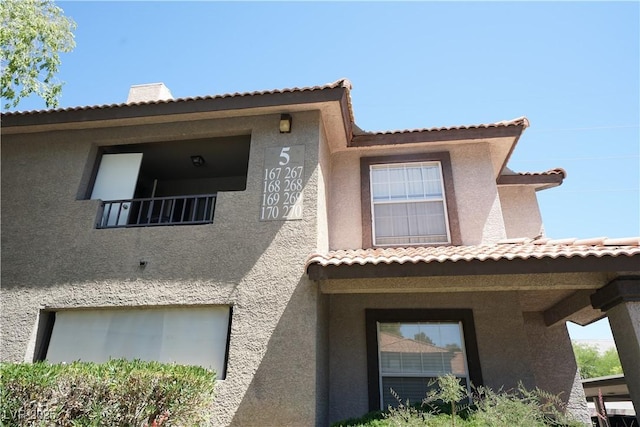 2606 S Durango Dr Unit 165, Las Vegas, NV 89117 - back of property featuring stucco siding and a tile roof