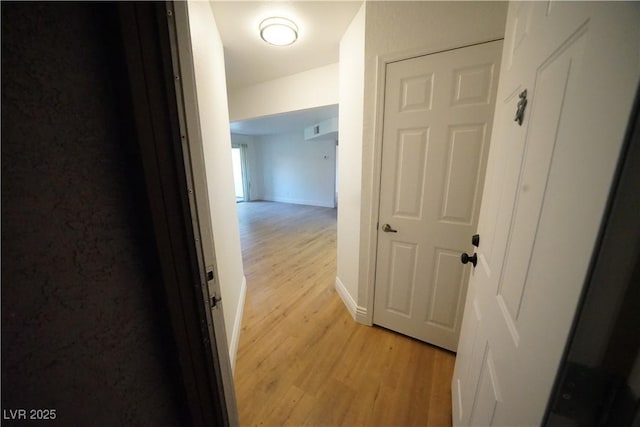 2606 S Durango Dr Unit 165, Las Vegas, NV 89117 - hallway featuring light wood finished floors and baseboards