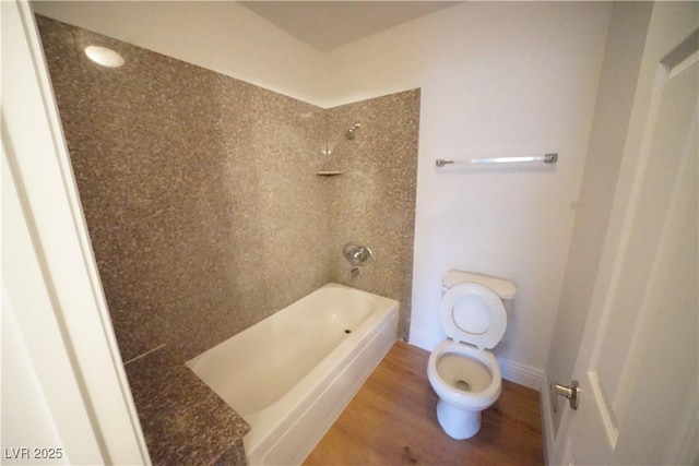 2606 S Durango Dr Unit 165, Las Vegas, NV 89117 - bathroom featuring toilet, wood finished floors, and shower / bath combination