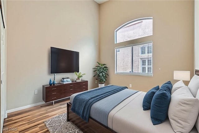 9622 Emeraude Ave, Las Vegas, NV 89147 - bedroom featuring light wood finished floors and baseboards