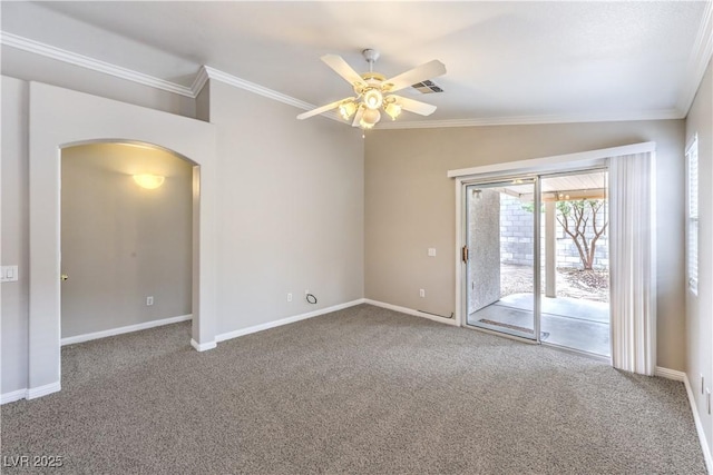 2177 Hidden Ranch Ter, Henderson, NV 89052 - carpeted empty room featuring arched walkways, ornamental molding, ceiling fan, and baseboards