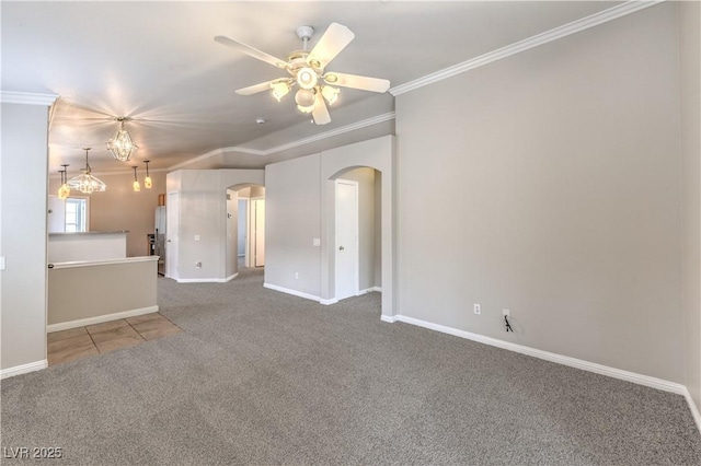 2177 Hidden Ranch Ter, Henderson, NV 89052 - unfurnished living room featuring arched walkways, carpet, ornamental molding, and baseboards
