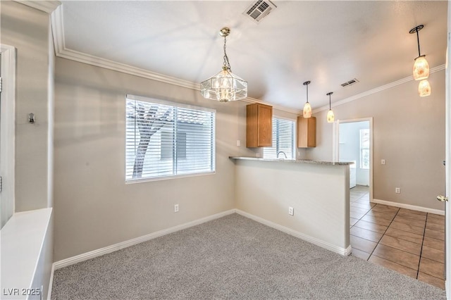 2177 Hidden Ranch Ter, Henderson, NV 89052 - kitchen featuring crown molding, a chandelier, light colored carpet, light countertops, and baseboards