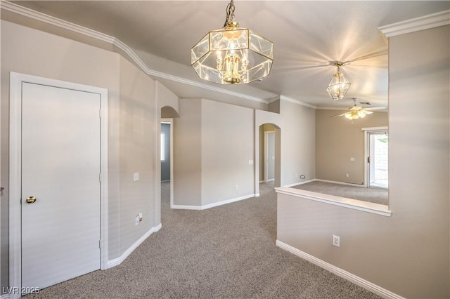 2177 Hidden Ranch Ter, Henderson, NV 89052 - carpeted spare room with arched walkways, ceiling fan, ornamental molding, baseboards, and a chandelier