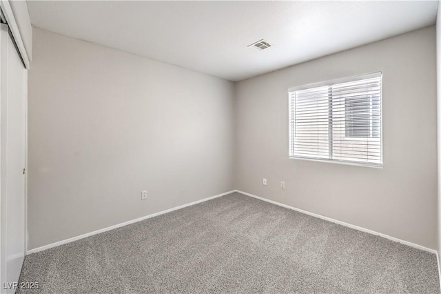 2177 Hidden Ranch Ter, Henderson, NV 89052 - unfurnished bedroom with carpet floors, a closet, and baseboards