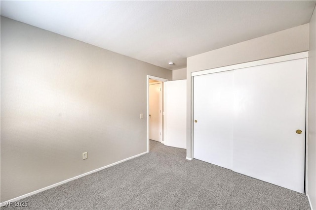 2177 Hidden Ranch Ter, Henderson, NV 89052 - unfurnished bedroom with carpet flooring and a closet