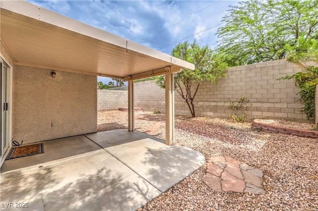 2177 Hidden Ranch Ter, Henderson, NV 89052 - fenced backyard with a patio area