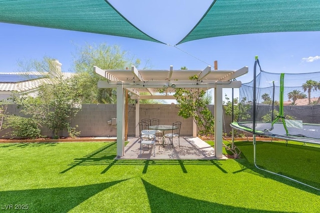 747 Canyon Crest Dr, Las Vegas, NV 89123 - view of yard featuring a trampoline, a patio, and a pergola