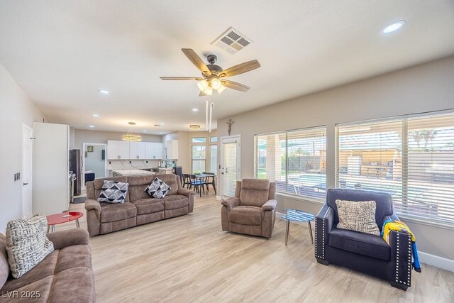 747 Canyon Crest Dr, Las Vegas, NV 89123 - living area with baseboards, light wood-type flooring, ceiling fan, and recessed lighting