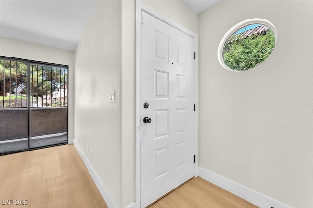 2964 Juniper Hills Blvd Unit 104, Las Vegas, NV 89142 - foyer entrance with light wood-type flooring and baseboards