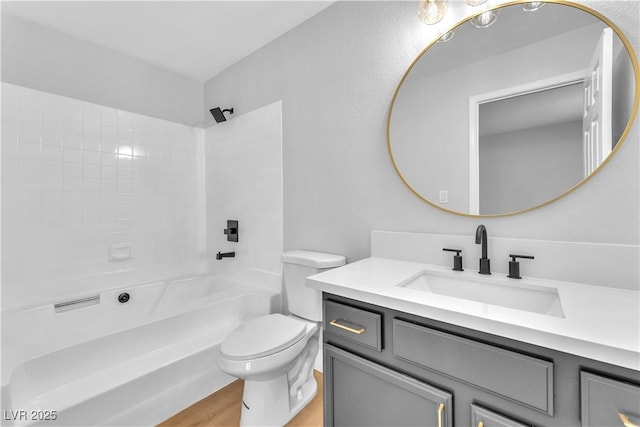 2964 Juniper Hills Blvd Unit 104, Las Vegas, NV 89142 - full bath with vanity, toilet, tub / shower combination, and wood finished floors
