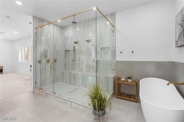 5225 Villa Dante Ave, Las Vegas, NV 89141 - full bath featuring a soaking tub, a marble finish shower, and recessed lighting