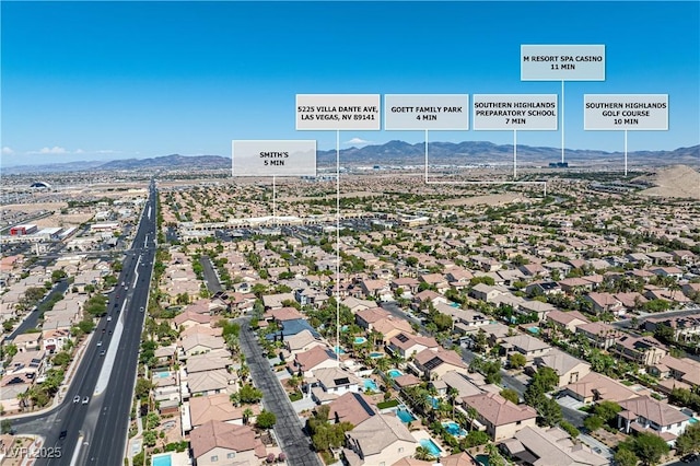 5225 Villa Dante Ave, Las Vegas, NV 89141 - aerial perspective of suburban area with a mountain backdrop