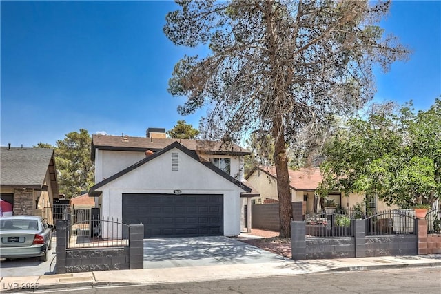 1805 Amboy Dr, Las Vegas, NV 89108 - view of front facade featuring an attached garage, driveway, a fenced front yard, and a gate