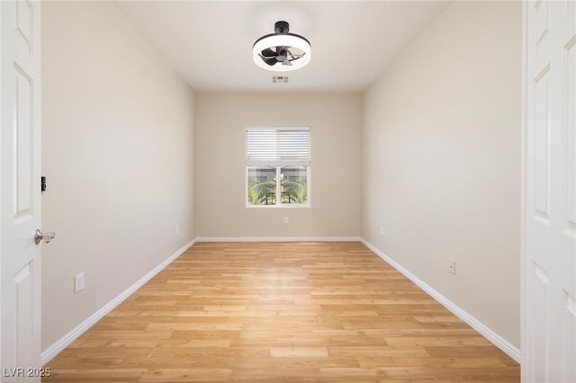 2221 River Grove Dr, Henderson, NV 89044 - unfurnished room featuring light wood-style flooring and baseboards