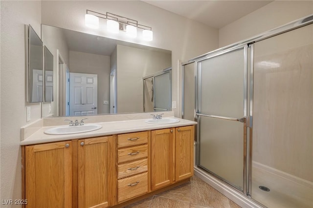 2221 River Grove Dr, Henderson, NV 89044 - bathroom with double vanity and a shower with shower door