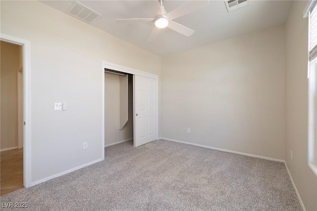 2221 River Grove Dr, Henderson, NV 89044 - unfurnished bedroom featuring light colored carpet, a closet, and a ceiling fan