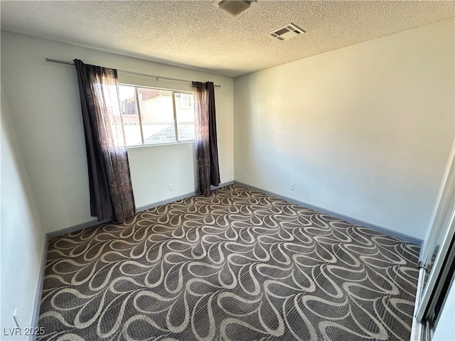 1304 Bonita Ave, Las Vegas, NV 89104 - spare room featuring carpet and a textured ceiling