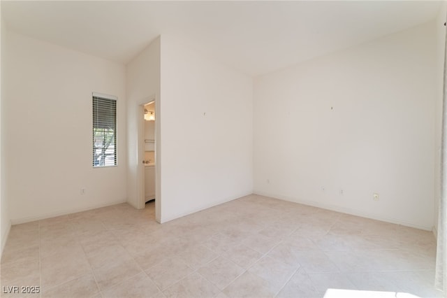 9025 Loggers Mill Ave, Las Vegas, NV 89143 - unfurnished room with baseboards and light tile patterned flooring