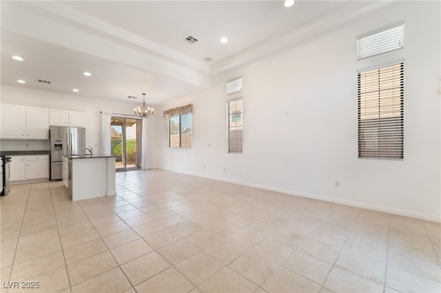 9025 Loggers Mill Ave, Las Vegas, NV 89143 - unfurnished living room with a chandelier, light tile patterned floors, recessed lighting, a sink, and baseboards