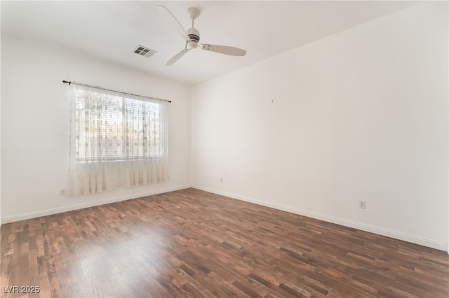 9025 Loggers Mill Ave, Las Vegas, NV 89143 - spare room featuring ceiling fan, dark wood-style floors, and baseboards